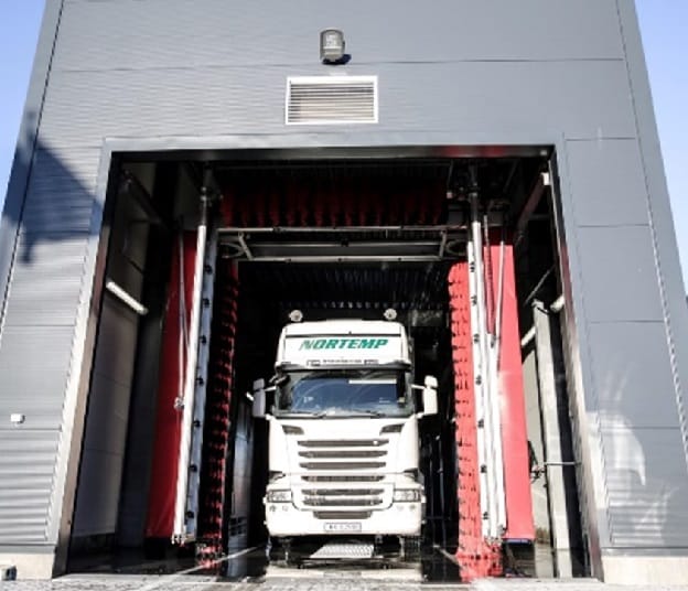 A truck on the way out from a carwash